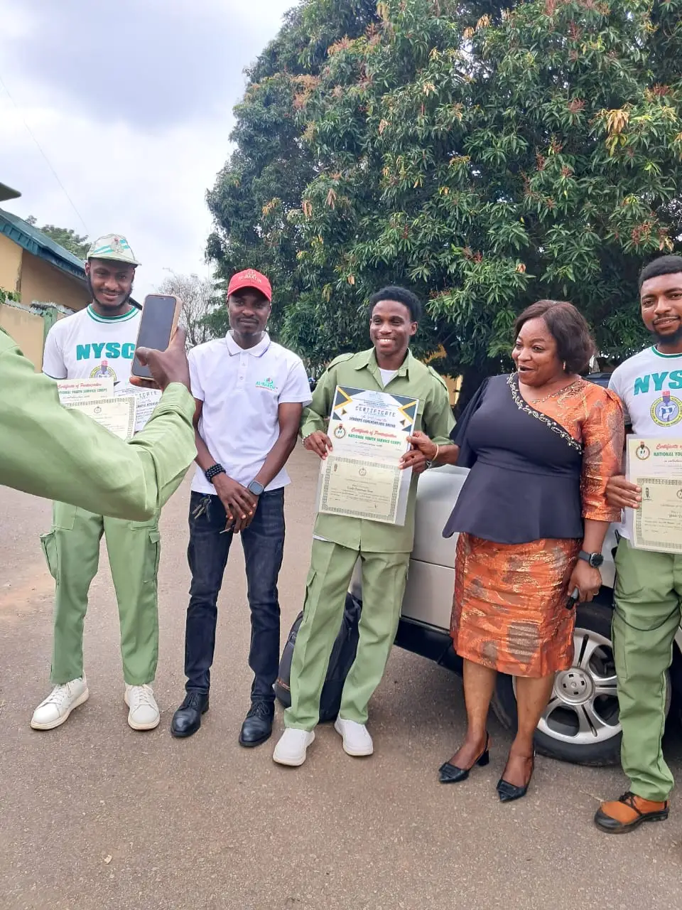Corps members receiving their certificates at the end of the programme.